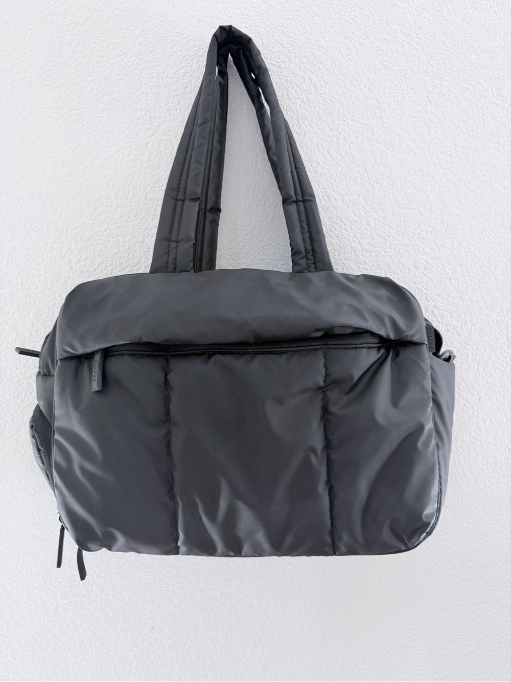 CALPAK Luka Duffel in Matte Black โข Excellent Condition